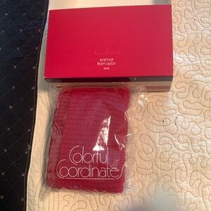 New in box and plastic. Avon knit cap from 1983.